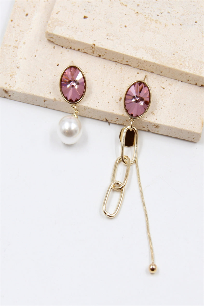 Boucle d'oreille asymétrique en cristal swarovski