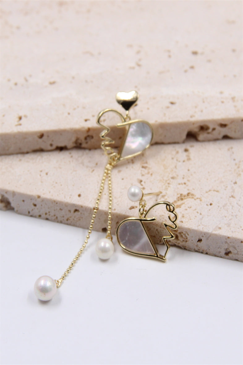 Boucle d'oreille cœur asymétrique