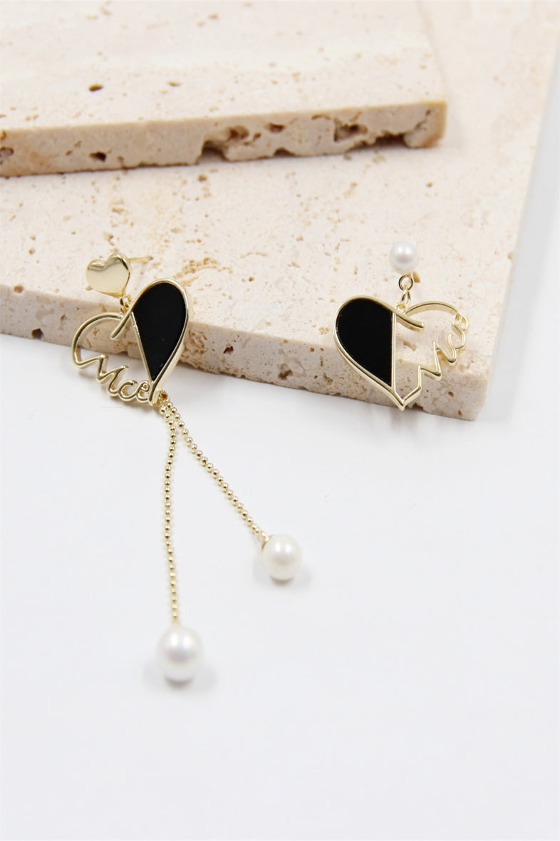 Boucle d'oreille cœur asymétrique