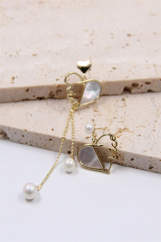 Boucle d'oreille cœur asymétrique